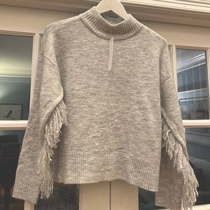 Olivia Sky fringe lined sweater